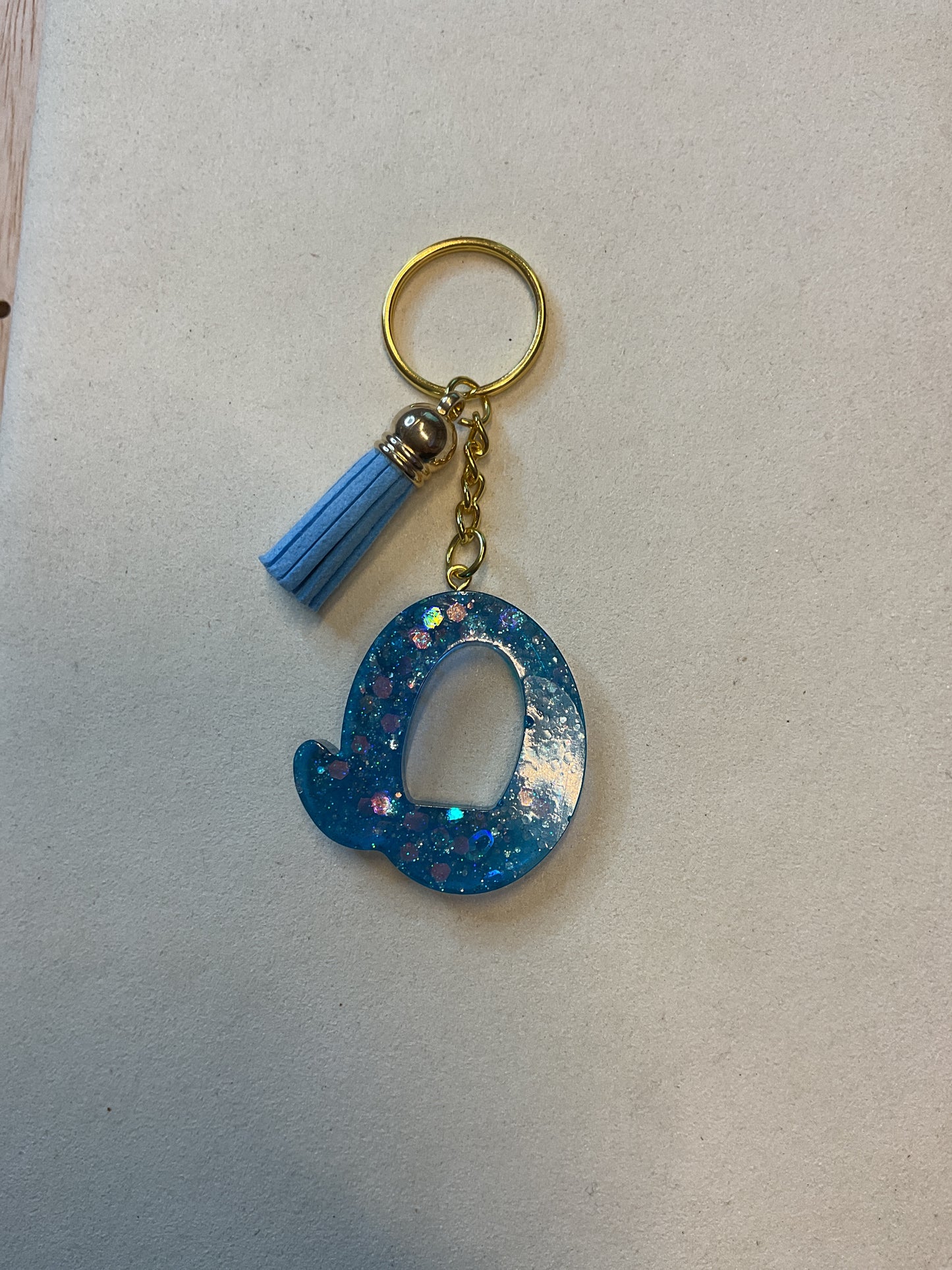 Porte clé Q BLEU