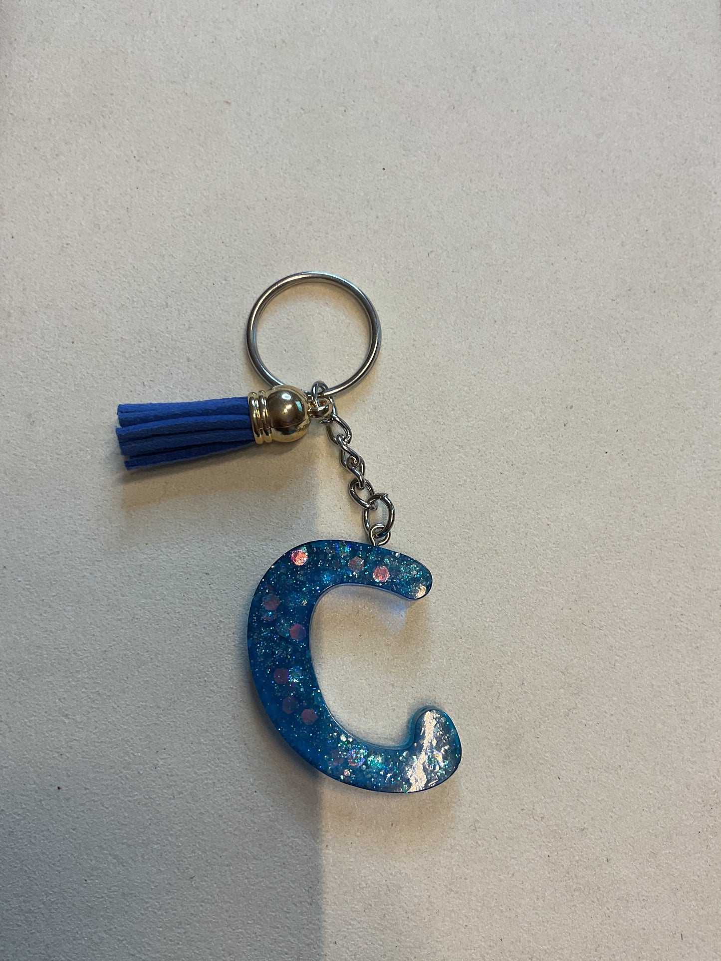 Porte clé C bleu