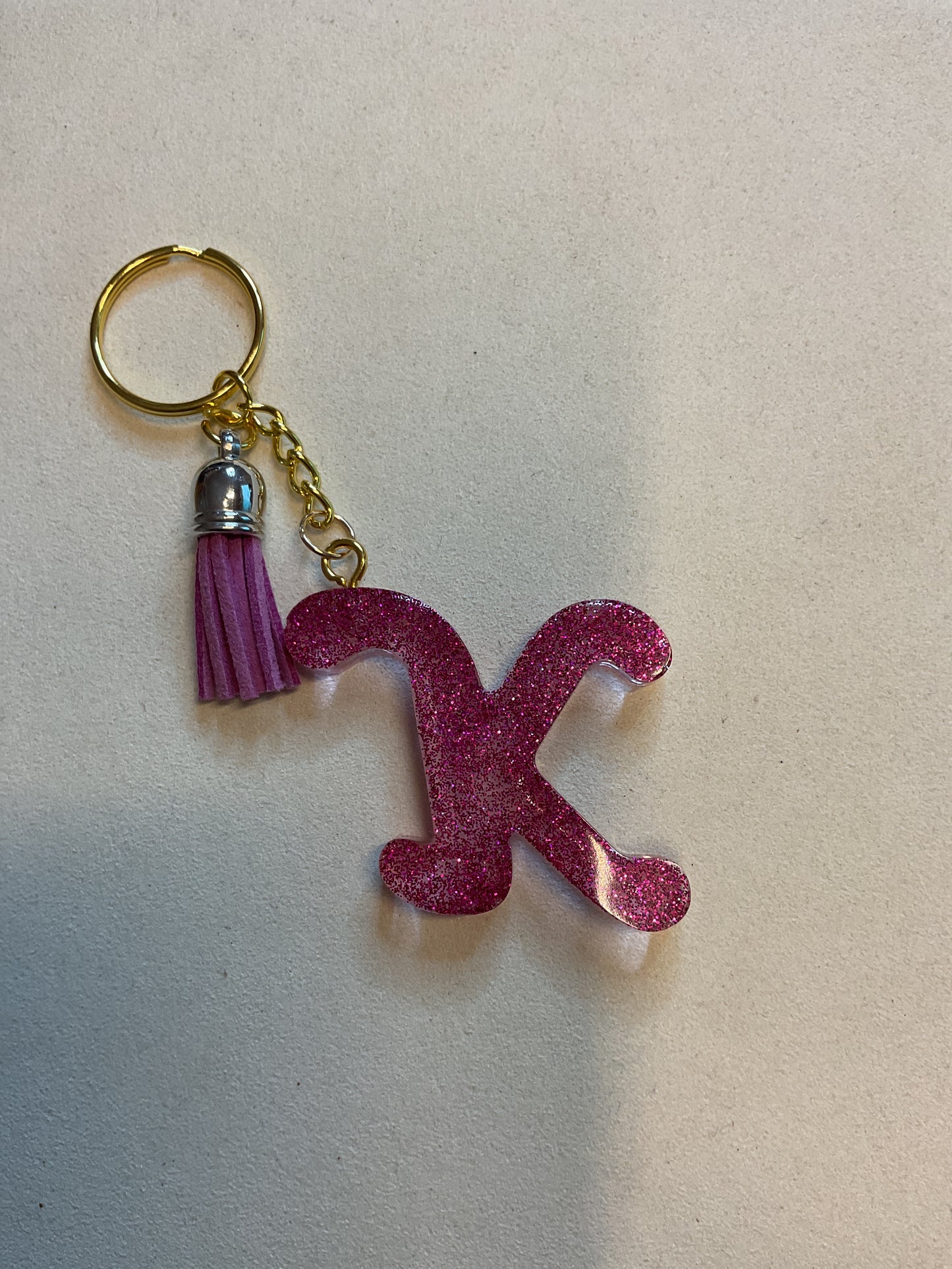 Porte clé K rose